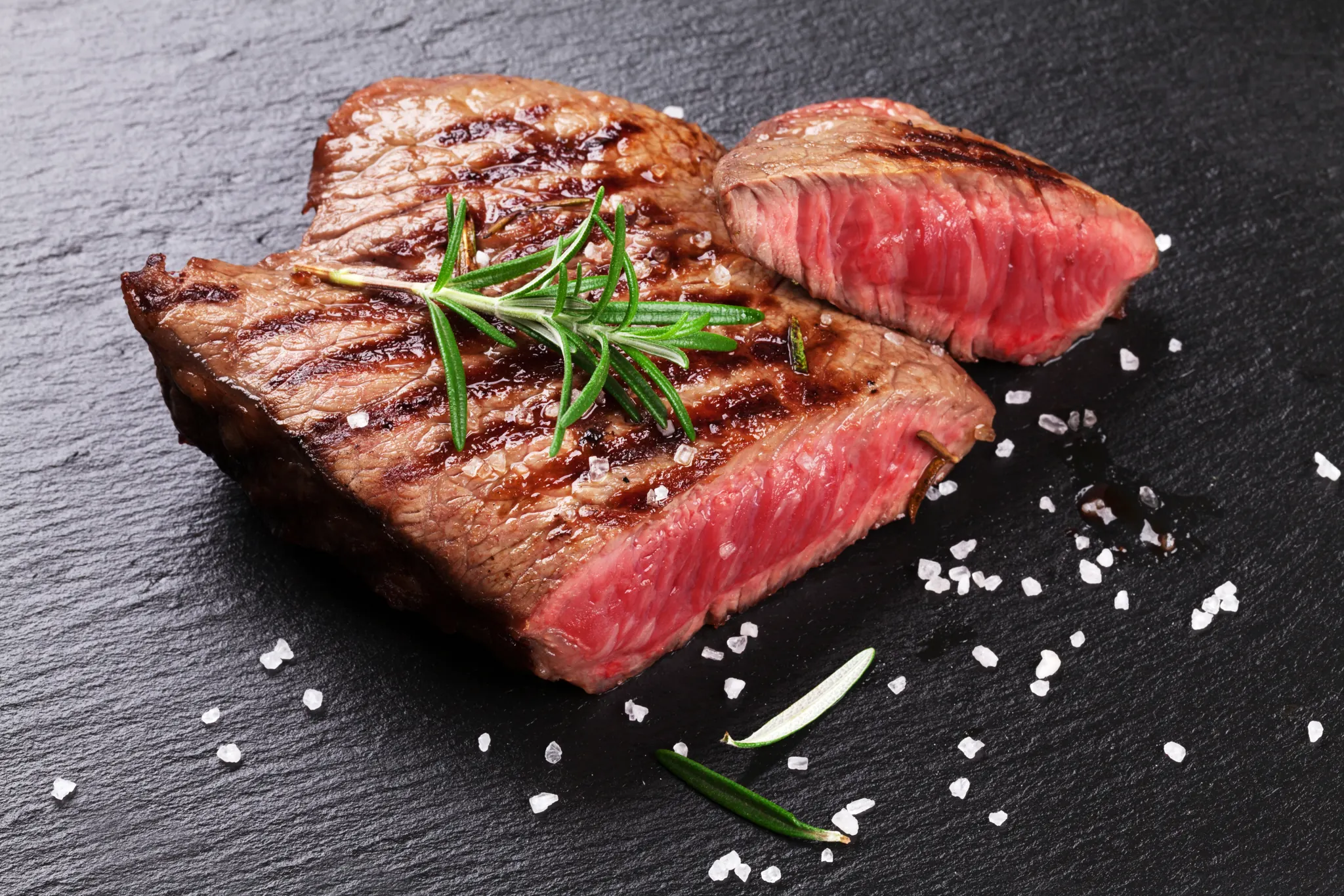 Juicy grilled steak with rosemary and sea salt